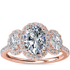 Anillo de compromiso de diamantes con halo ovalado y tres piedras en oro rosado de 14 k